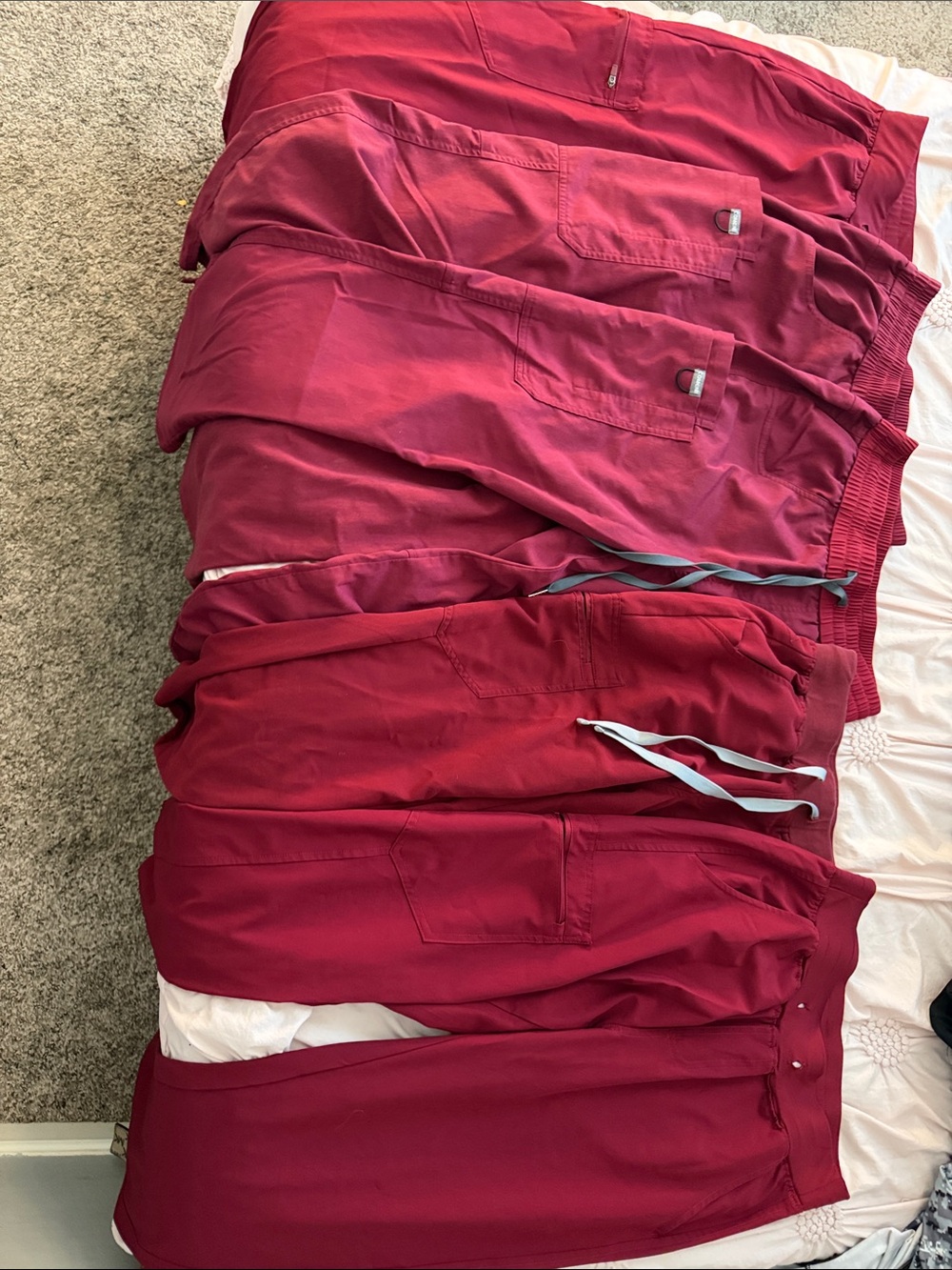 4x pairs of Women’s maroon/red scrub pants (size small)